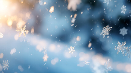 青い冬の背景に舞う輝く雪の結晶と幻想的な金色の光