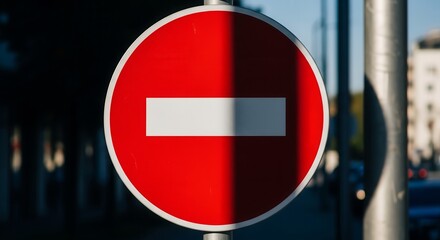 Red Stop Sign Illuminated by Sunlight Signifying Restriction and Defiance