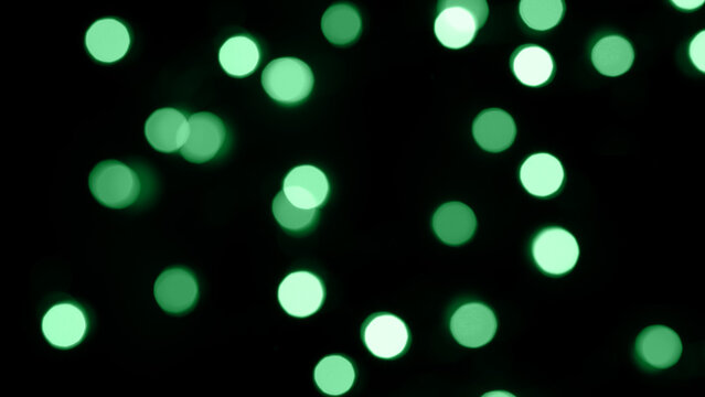 abstract background of green bokeh lights,bokeh green lights on black background,light leak overlay effect with rainbown bokeh ,Christmas xmas bokeh backgrou,glitter bokeh sparkles lights