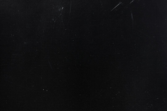 grunge overlay effect with scratch and dust on black background,retro film noisy grain dust texture,dark grunge distressed old photo texture overlay,black grunge background with scratch and dust