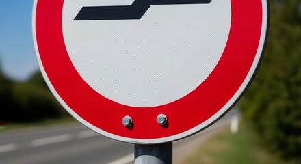 Roadside Sign With Directional Symbols And Circular Shape On A Sunny Day