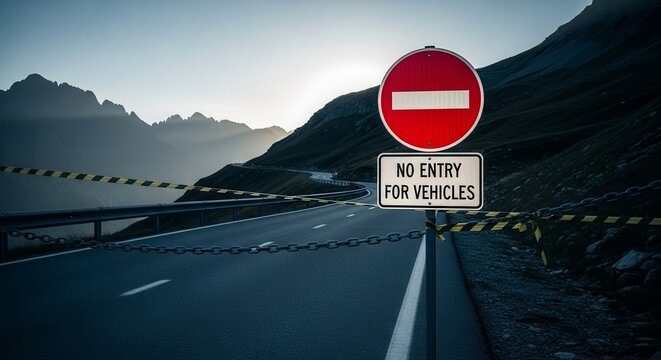 Road Closure Sign Barricade On An Asphalt Road With Mountain Landscape, No Entry For Vehicles