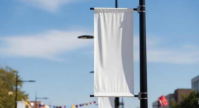 Blank White Vertical Street Banner Mockup on City Lamppost Against Bright Blue Sky Clean Advertising Template