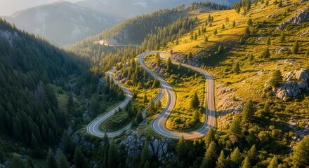 Scenic Winding Road Through Majestic Green Mountain Landscape in a Sunny Day