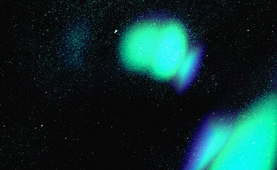 Abstract glowing green and blue light leaks background with starry film grain texture