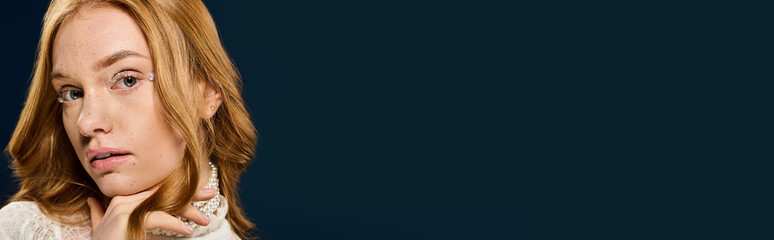 Captivating beauty exudes confidence in a stunning portrait against a dark backdrop