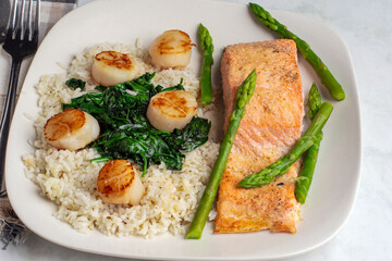 baked salmon   with scallops  and rice