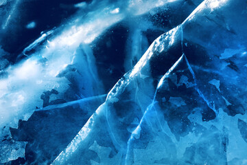 Deep blue ice texture with intricate patterns of cracks.