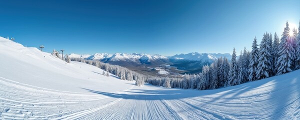 Ski resort panorama with groomed snow slope, mountain range. Winter landscape shows ski lift, snowy forest, bright sun. Perfect for active holiday travel, sport recreation in nature. People enjoy