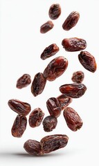Obraz premium Dried dates in mid-air (1)