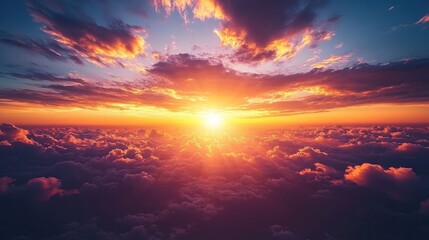 Golden sunset bathes fluffy clouds in orange and red hues, radiating beams across a vast sky