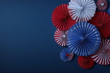 Patriotic Fanfare: A collection of red, white, and blue paper fans create a festive display, evoking a sense of celebration and national pride against a deep blue backdrop.