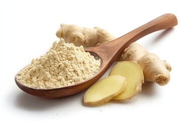 Ground ginger in wooden spoon with fresh ginger root