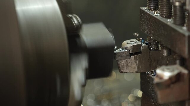 VDO 4K Lathe is working on turning metal parts for industrial use.	