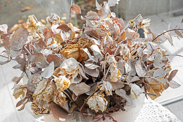 Beautiful dried bouquet in a vase in the interior