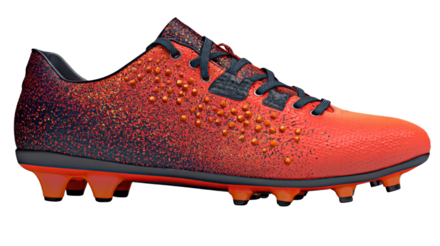 Modern red and black textured football boot with studs and laces designed for athletic performance, soccer training, and sport equipment themes on white background