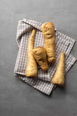 Top view of parsnip roots on napkin food