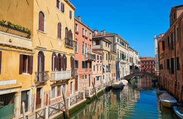 Gondolas on a canal in Venice