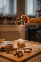mother and daughter baking christmas cookies