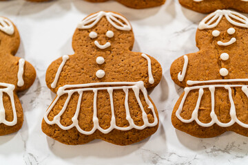 Decorating Gingerbread Girl Cookies with Royal Icing Designs