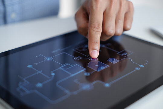 Finger Tapping Digital Screen With Blue Network and Lines Presenting Technology Connectivity and Modern Interface Concept - Powered by Adobe