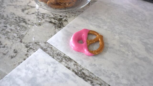 Young Chef Prepares Chocolate-Covered Treats in Sunny Kitchen