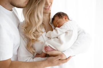 Loving Family with Newborn Tender Moments of Parenthood and Infant Care Bliss