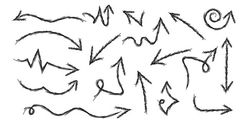 A set of black hand-drawn arrows. A collection of textured arrows. Doodle elements on an isolated background. Vector.