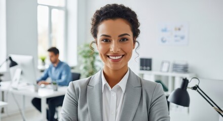 Smiling professional woman in a modern office setting
