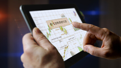 Ecommerce online business charts graphs on touchscreen pad display