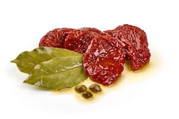 Sun Dried Tomatoes with Bay Leaves and Capers, isolated on white background