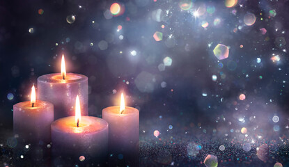 Advent Candles - Four Purple Candlelights Glowing In Shiny Dark Background With Glittering And...