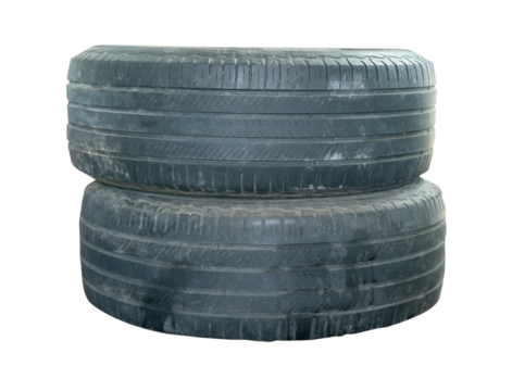 Two old black truck tires in stack isolated with clipping path in png file format - Powered by Adobe
