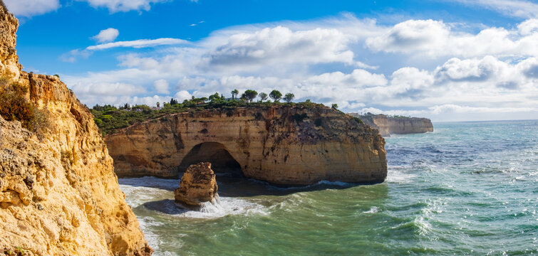 View of Praja da Marinha, Portugal with its characteristic rock formations