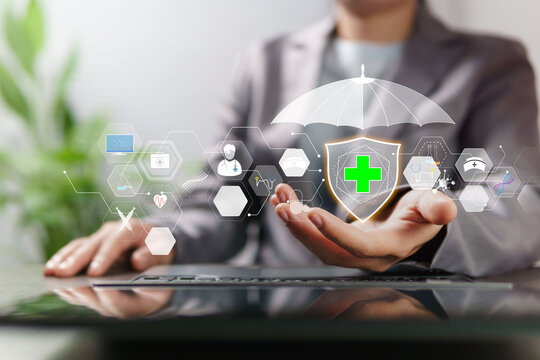 Accessible digital healthcare, AI technology in medicine. Businessman's hand working on laptop device with icons related to health information and access to medical services via virtual platform.