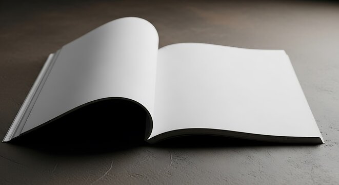 Open blank magazine or book with empty white pages on a dark, textured surface, ready for custom content or design presentation
