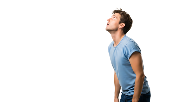 A young man is looking up with his mouth open isolated on transparent background he is wearing a blue shirt and jeans - Powered by Adobe