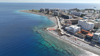 Fototapeta premium Aerial drone photo of famous main sandy beaches of Rhodes island west coast called Akti Miaouli and Akti Kanari famous for luxury hotels and nice seaside restaurants, Dodecanese, Greece