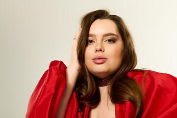 Celebrating winter holidays in a stunning red outfit with joyful elegance