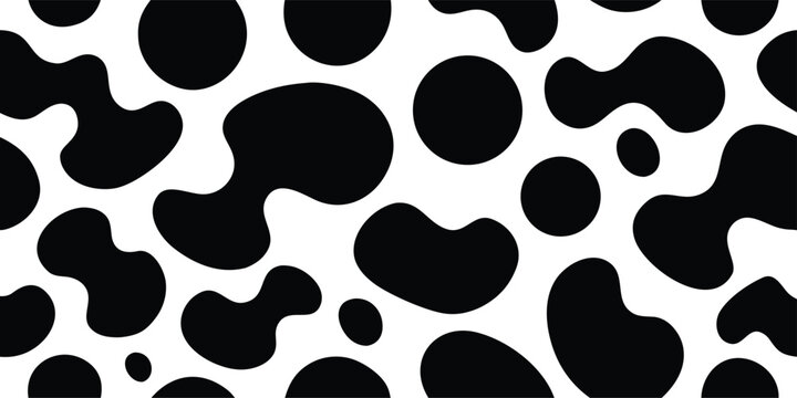 Seamless abstract monochrome pattern of organic black shapes and circles on a clean white background, resembling cow spots or dalmatian print, ideal for design.