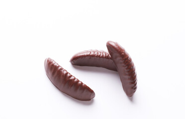 Chocolate candies on white background. Top view