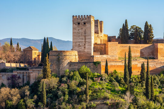 Alcazaba fortress of Alhambra complex at sunset, Granada, Spain