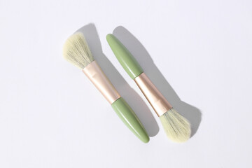 Premium makeup brushes set on white background. Beauty concept.