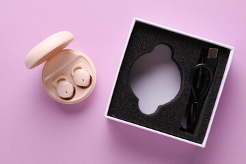 New Modern Wireless Bluetooth Vacuum Earbuds with Charging Case and box on Purple Background