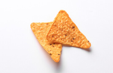 Triangular appetizing corn tortilla chips slices on white background