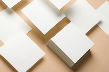 Composition of floating white square memo papers on yellow background. Business concept