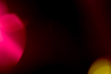 Captivating dual-color light leak featuring vibrant magenta glow in upper-left and golden yellow luminescence in lower-right corner creating contrasting warm palette. Authentic film photography effect