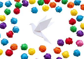 Symbol of peace featuring origami dove with paper