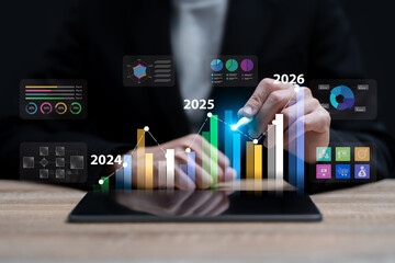 Businesswoman Analyzing Business Growth Projection from 2025 to 2026, Evaluating Financial Expansion, Online Marketing Trends, Strategic Forecasting, and Performance Insights for Future Success