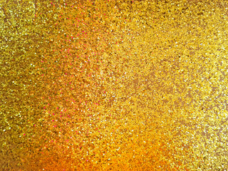 Background made of blurry a pile of gold glitter gradations for decoration. Handcraft made of a...